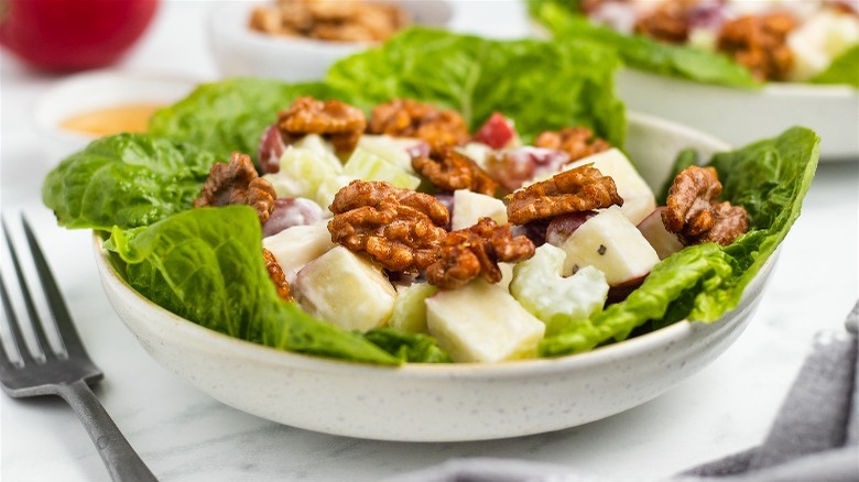 candied walnut waldorf salad in bowls 