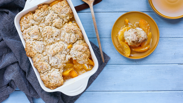 Peach cobbler in baking dish 