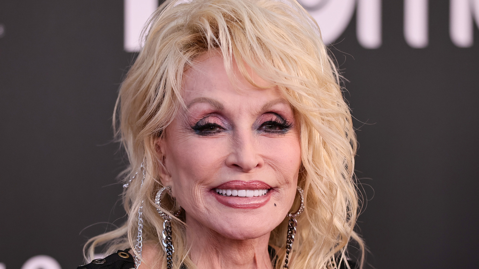 Canned Fruit Is The Secret To Dolly Parton's Famous 3-Ingredient Cake