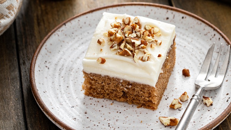 cake with frosting and nuts