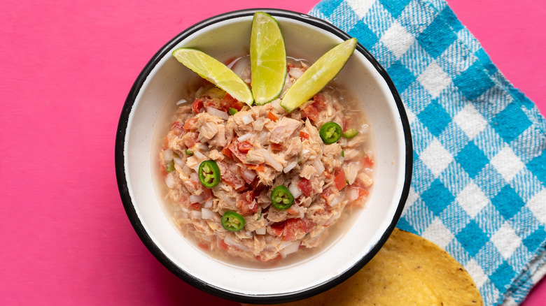 Canned tuna ceviche next to tostada