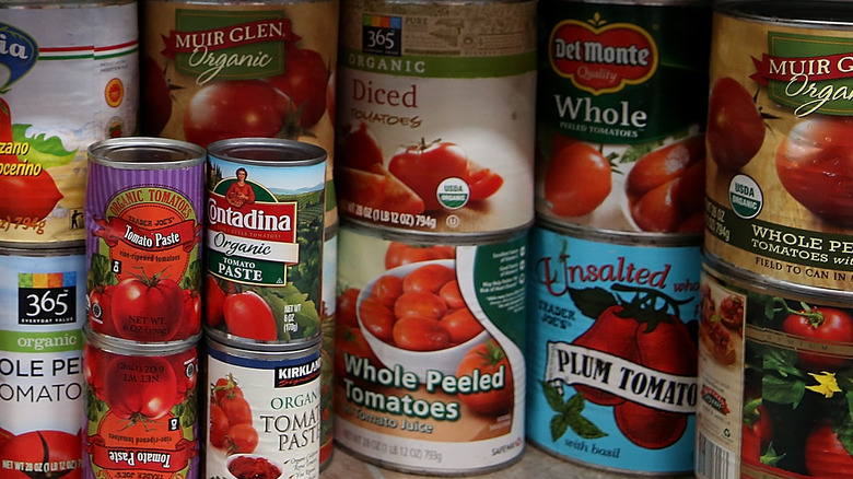 Assorted cans of tomatoes