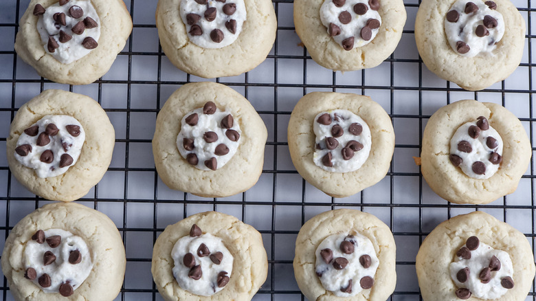 cannoli thumbprint cookies on rack