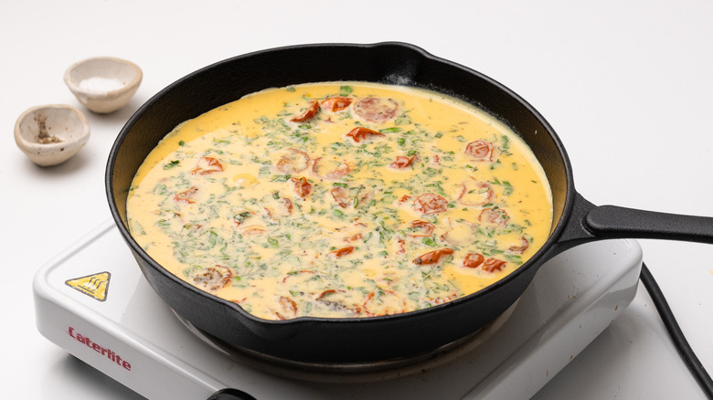 frittata mixture in skillet pan