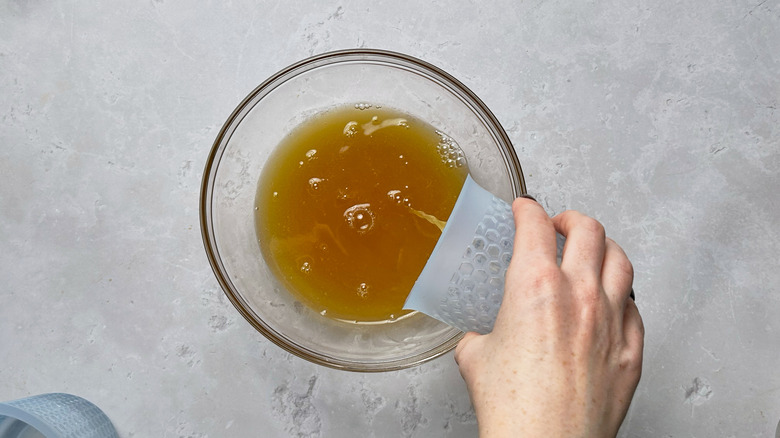 pouring liquid into bowl