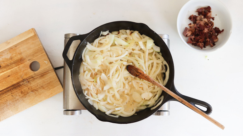 sliced onions in pan