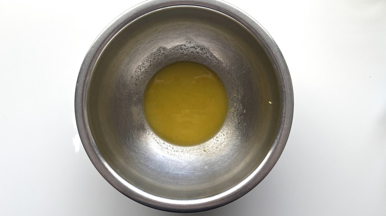 salad dressing in metal bowl