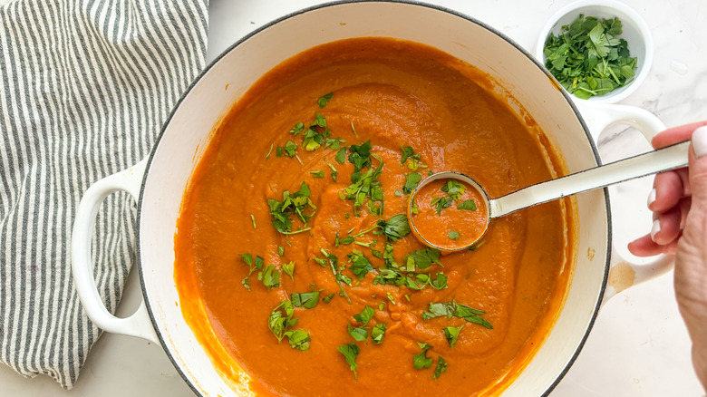 orange soup with cilantro