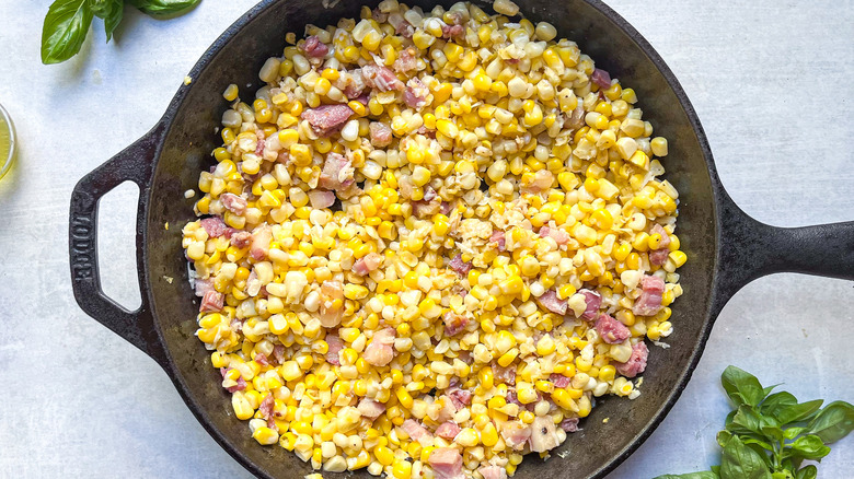 corn and pancetta in pan