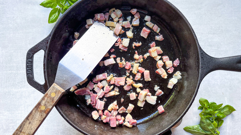 diced pancetta in frying pan