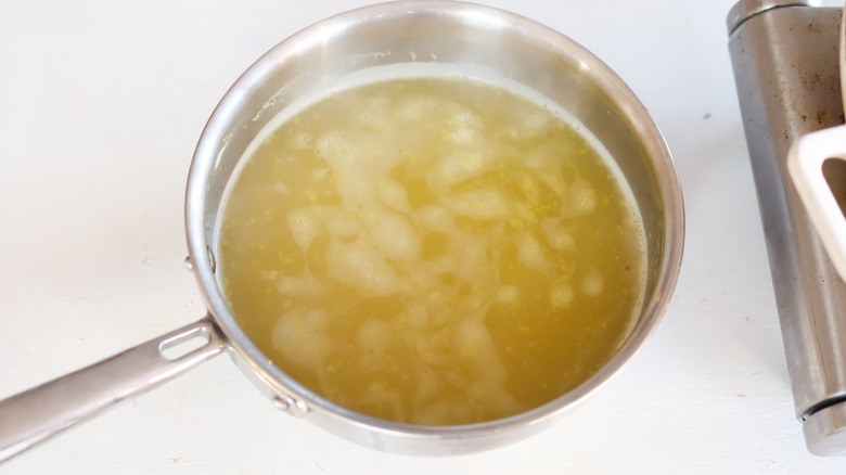 chicken broth in a pot