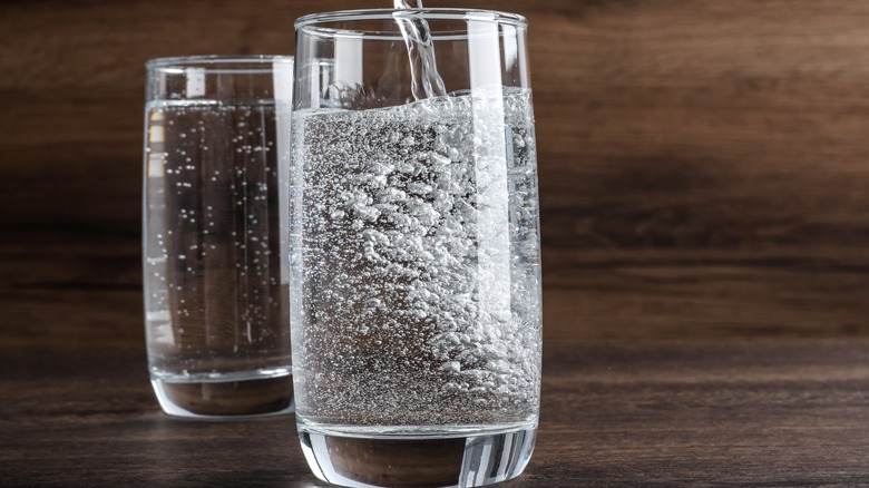 glass with fizzy soda water