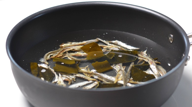 water with anchovies and kelp 