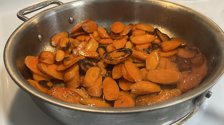 sliced carrots in metal pan