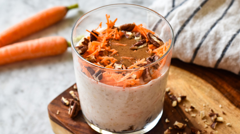 carrot cake overnight oats in glass with almond butter