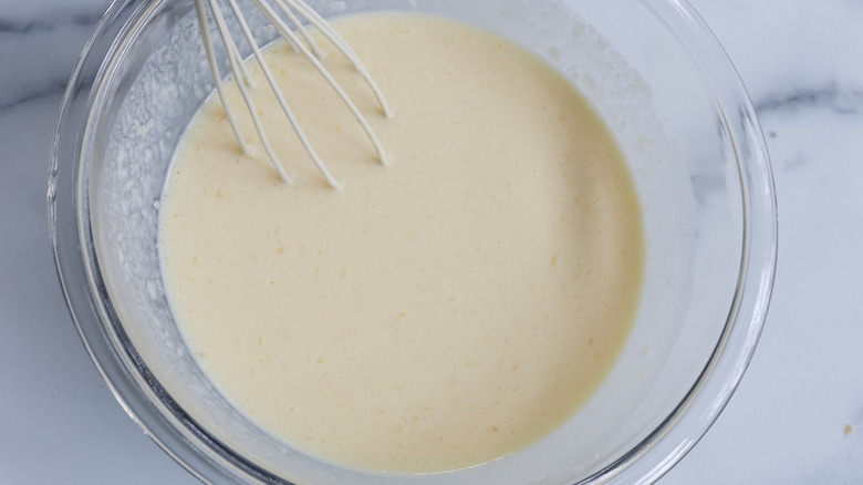 milky liquid in mixing bowl