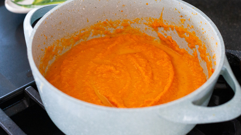 pureed carrot soup in pot