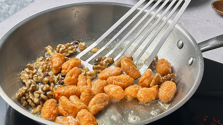 sauteeing gnocchi in skillet