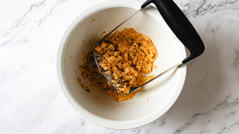 mashing plantains