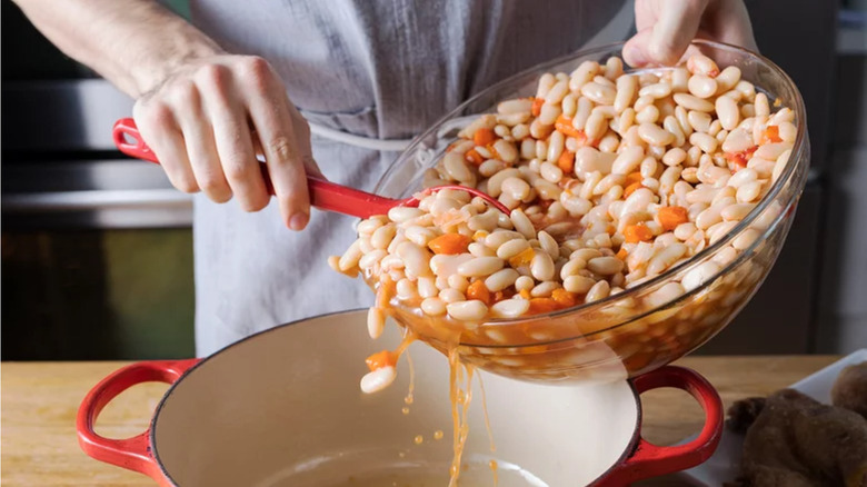 Beans added to casserole pot