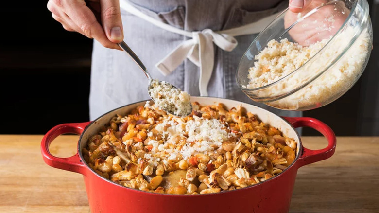 Bread crumbs sprinkled on cassoulet