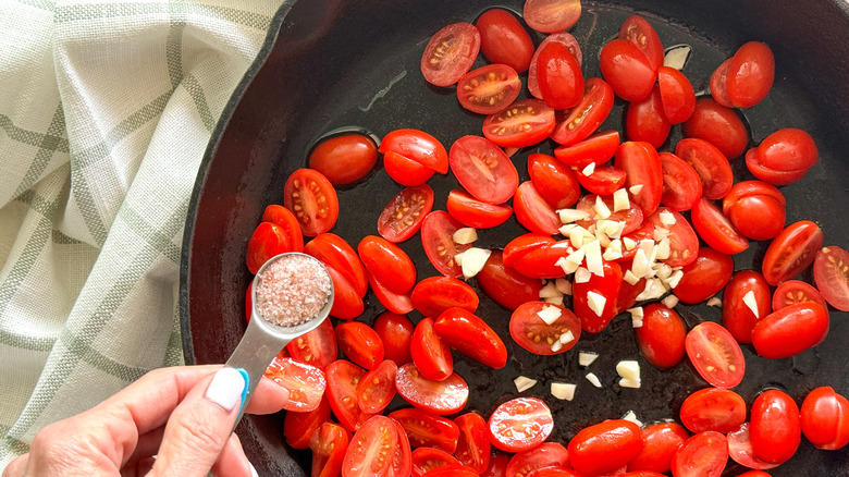 adding salt to pan