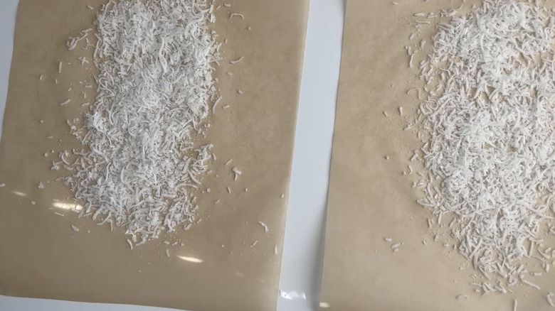 Crushed coconut on parchment paper