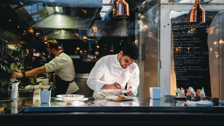 Employees working in a kitchen