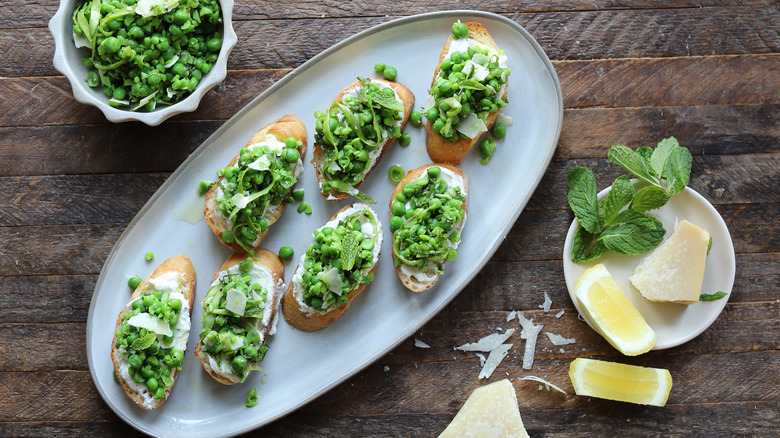 Plate with fresh mint pea crostini