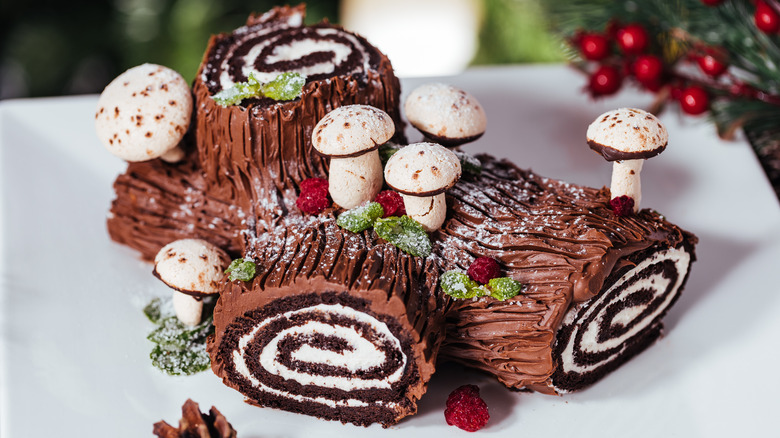 Yule log decorated with mushrooms