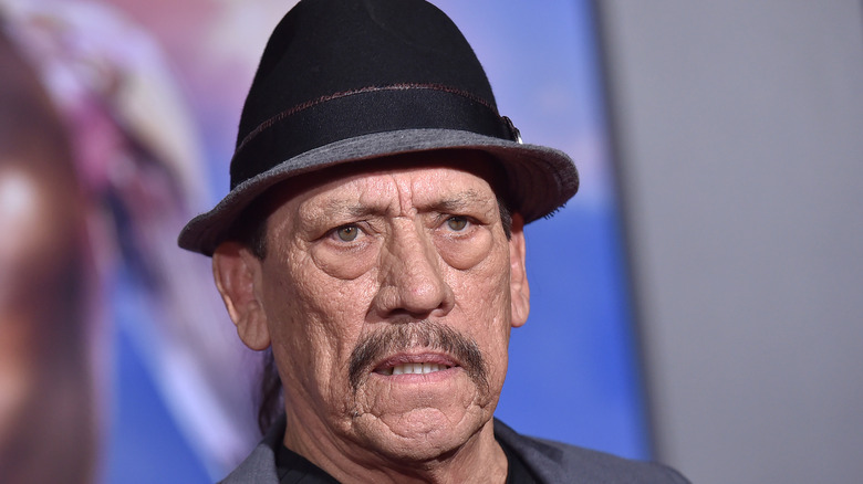 Danny Trejo wearing hat