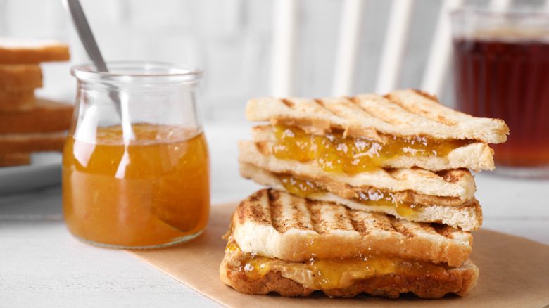 Grilled peanut butter apricot sandwich on plate 