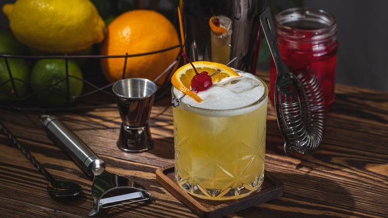 Whiskey sour with orange garnish