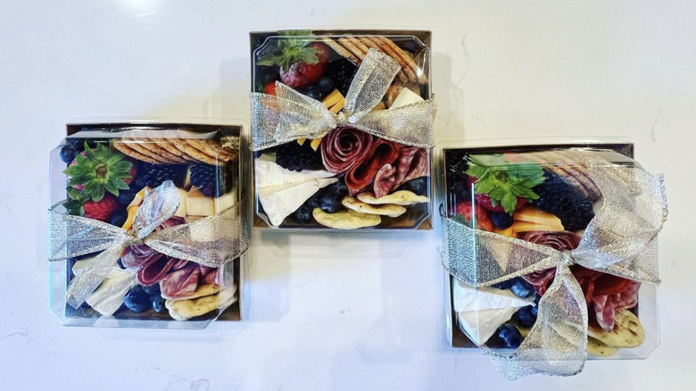 charcuterie snack boxes in bows