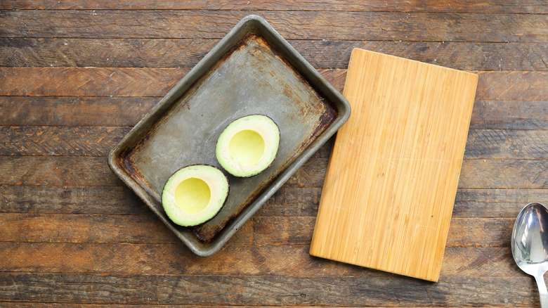 Prepared avocado on sheet tray