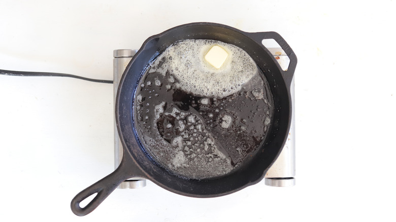 melted butter in skillet