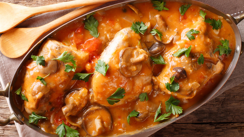 chicken chasseur in cooking pot