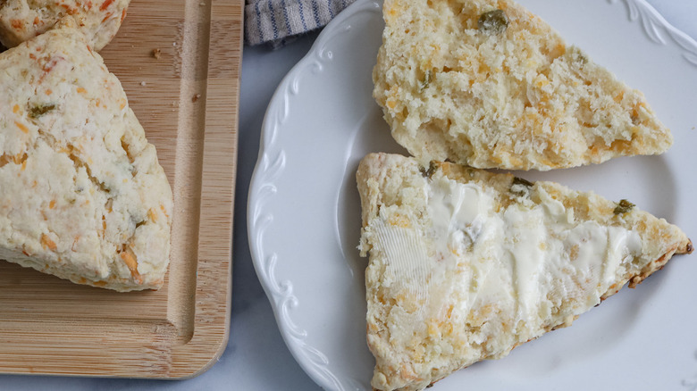 sliced scone with butter