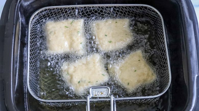 dough squares in oil