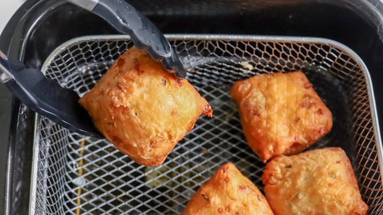 dough squares in oil