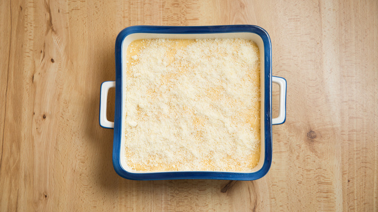 unbaked grits casserole in dish
