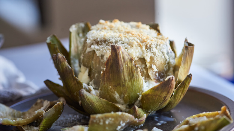 stuffed artichoke on plate 