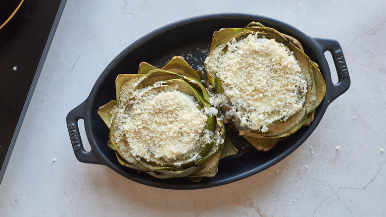 stuffed artichoke in baking dish 