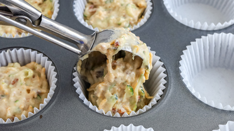 muffin batter going into liner