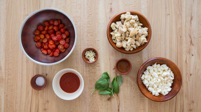 Caprese salad ingredients on table