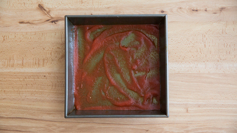 tomato puree lining baking pan