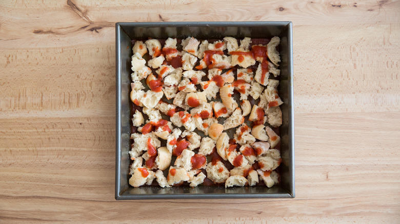 bread and tomatoes in pan