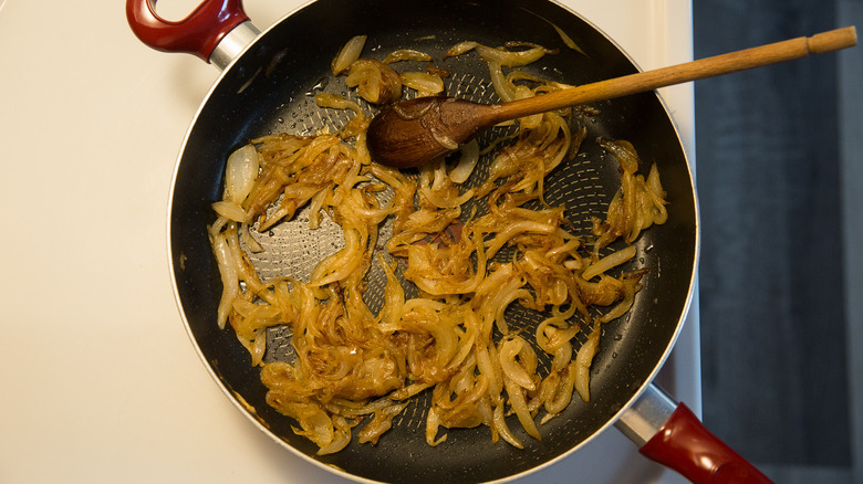 caramelized onions cooking in pan 