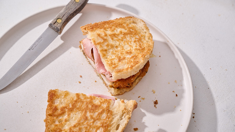 chicken cordon bleu panini on plate