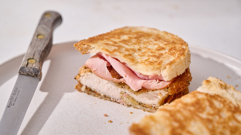 chicken cordon bleu panini on plate